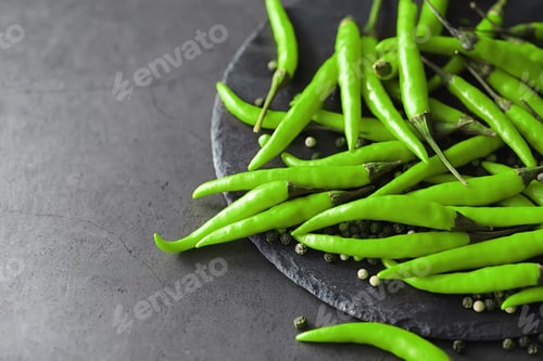 Preview: Hot Green Pepper. Chilean Pepper On A Black Background.