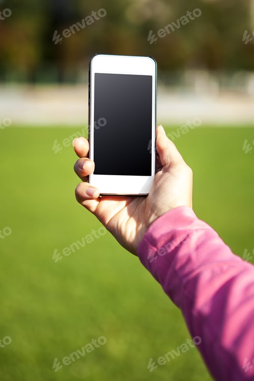 Preview: Phone In Hand On The Field Backgrounds
