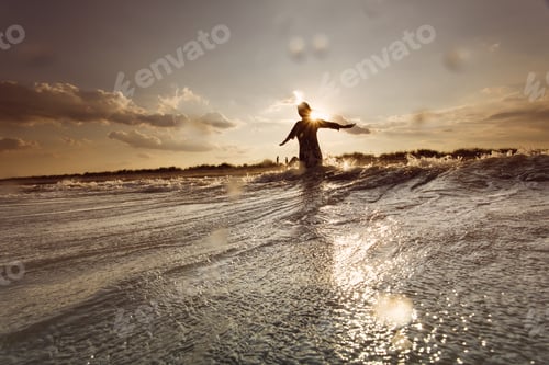 Preview: Young Woman On Sea Embracing The The World And The Waves