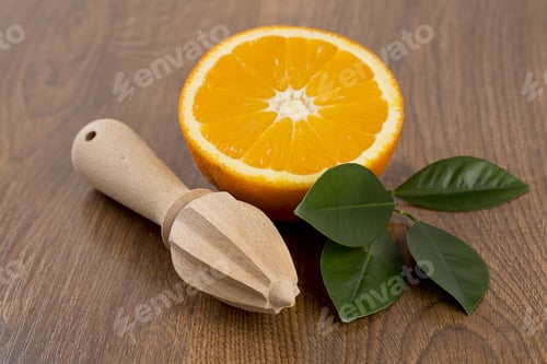 Preview: Cut Oranges On Wooden Surfce