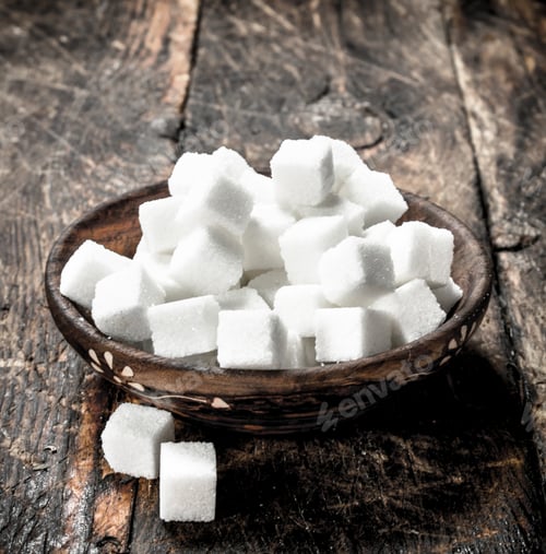 Preview: Cubes Of Sugar In A Bowl. On A Wooden Background