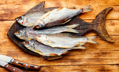 Preview: Sun Dried Fish,Salted Fish For Beer On Old Wooden Table