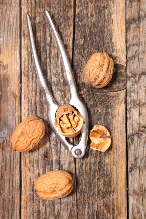 Preview: Walnut On Wood Background, Top View