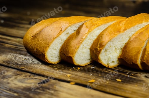 Preview: Sliced White Bread On Rustic Wooden Table