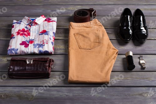 Preview: Collage Of Beautiful Clothes On A Wooden Background.