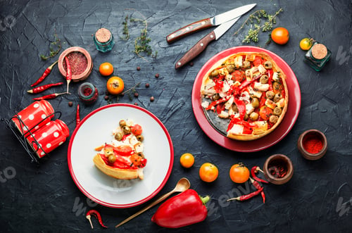 Preview: Appetizing Tart With Cheese, Peppers And Olives.Sliced Tart