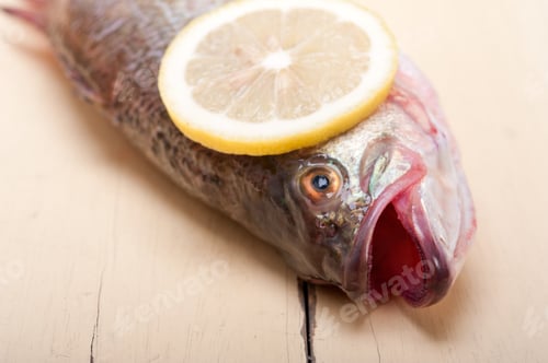 Preview: Fresh Whole Raw Fish On A Wooden Table Ready To Cook