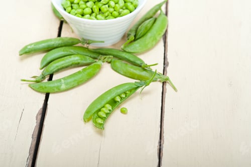 Preview: Hearthy Fresh Green Peas Over A Rustic Wood Table