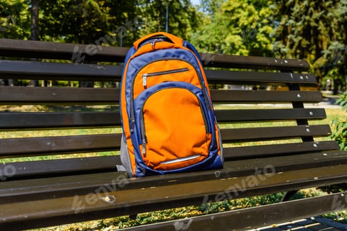 Preview: Tourist Backpack On Bench In City Park