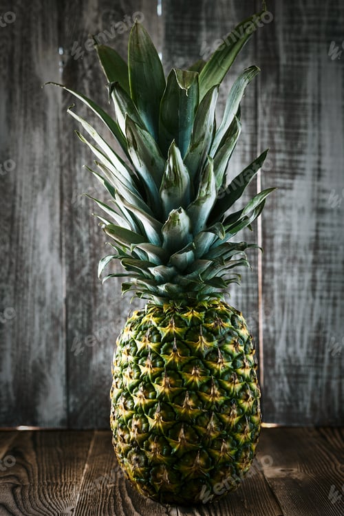 Preview: Pineapple Isolated On A Wooden Background