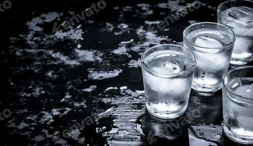 Preview: Vodka Shots With Ice. On The Black Chalkboard.