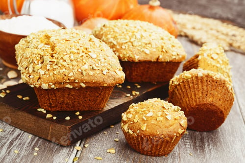 Preview: Homemade Pumpkin Cakes On The Wooden Table