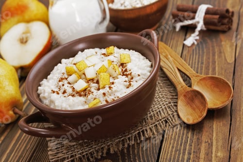 Preview: Oatmeal With Caramelized Apples In The Ceramic Bowl