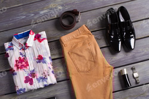 Preview: Summer Men'S Clothing On A Dark Wooden Background.