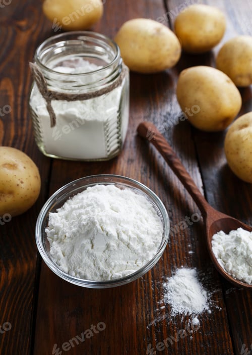 Preview: Potato Starch In A Glass Bowl On Wooden Table