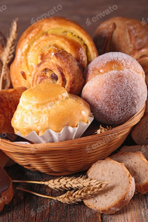 Basket of Freshly Baked Bread and Pastries