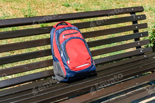 Preview: Tourist Backpack On Bench In City Park