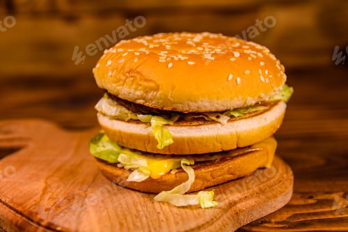 Preview: Fresh Hamburger On A Rustic Wooden Table