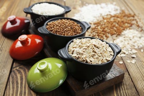 Preview: Buckwheat, Oats And Rice In A Ceramic Pot On The Table