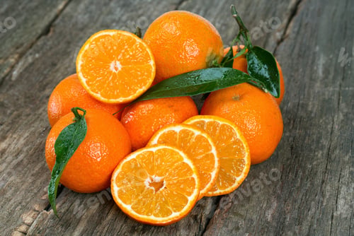 Preview: Tangerines With Leaves On Wooden Table