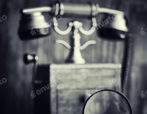 Preview: Old Telephone And Retro Book On The Desk. The Phone Of The Past On An Old Wooden Countertop