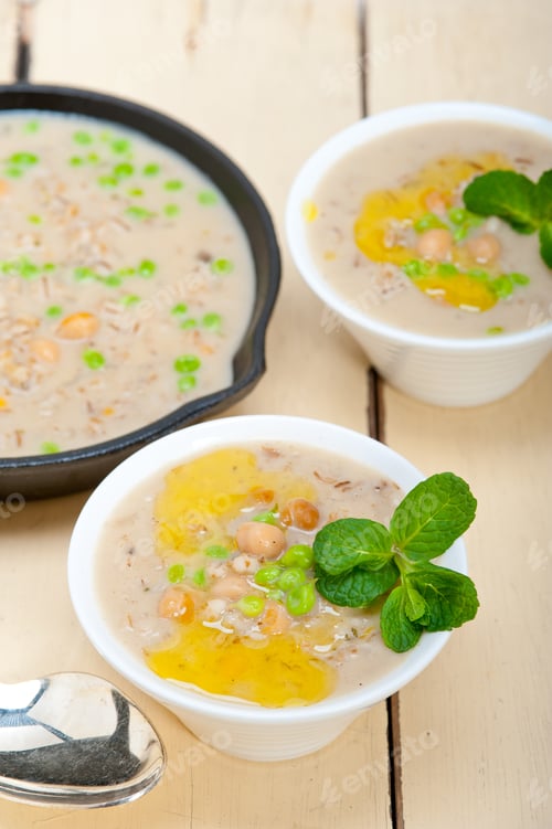 Preview: Hearty Middle Eastern Chickpea And Barley Soup With Mint Leaves On Top