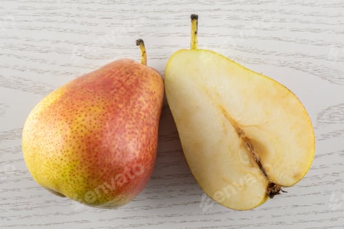 Preview: Fresh Raw Red Pear On Grey Wood