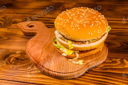 Preview: Fresh Hamburger On A Rustic Wooden Table