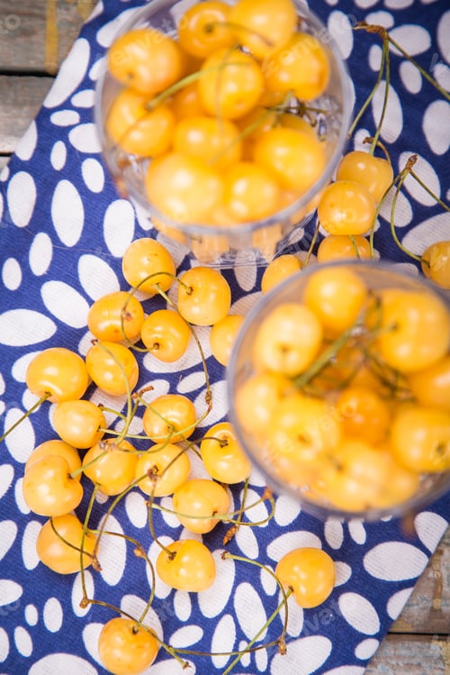 Preview: Fresh Ripe Raw Yellow Sweet Cherry In Glass