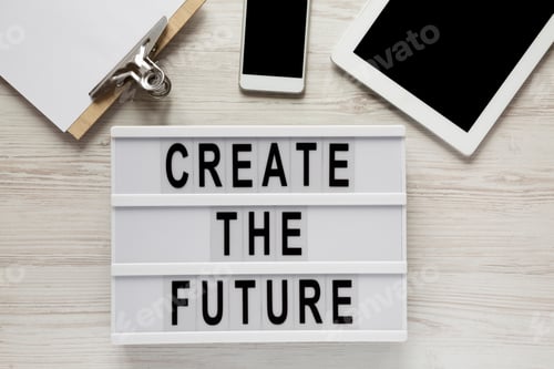 Preview: 'Create The Future' Word On Modern Board, Tablet, Noticepad, Smartphone On A White Wooden