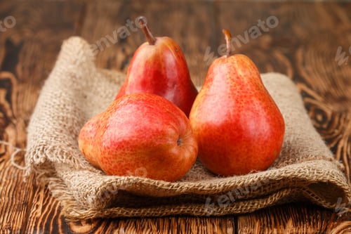 Preview: Ripe Juicy Organic Red Pears On The Wooden Table. Selective Focus