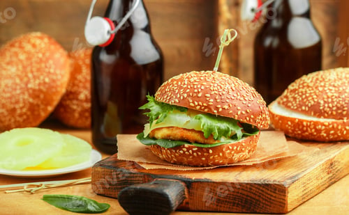 Preview: Delicious Homemade Burger With Chicken, Herbs, Cheese, Tomatoes And Pineapples On A White Bun With