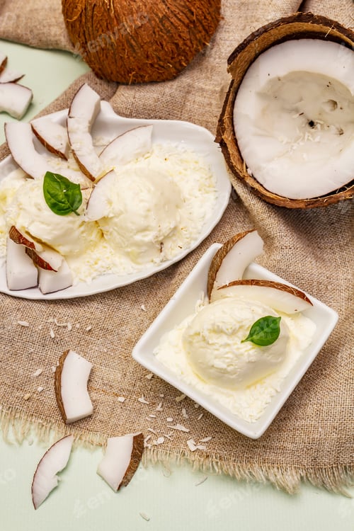 Preview: Lactose Free Coconut Ice Cream. Special Spoon, Halves Of Fruit, Flakes. Vegan Dessert Concept