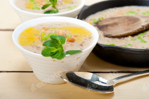 Preview: Hearty Middle Eastern Chickpea And Barley Soup With Mint Leaves On Top