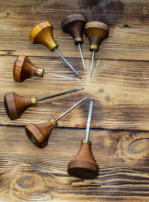 Preview: Different Gravers For Jewelry On A Wooden Background