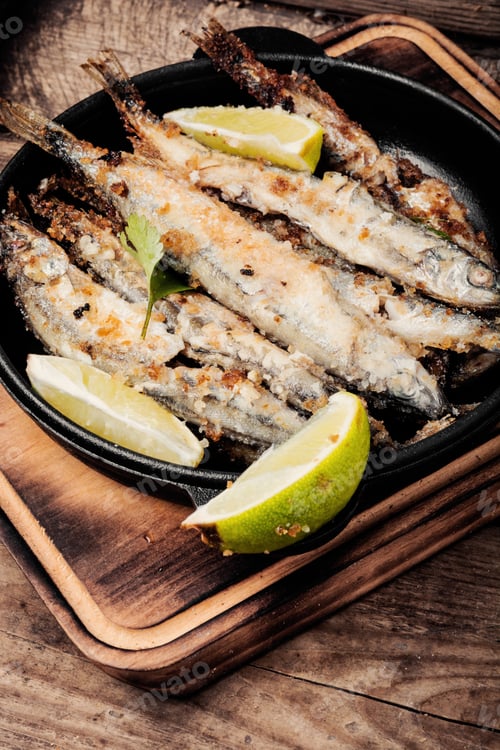 Preview: Fish Fried Breaded On Iron Cast Pan.Deep-Fried Fish