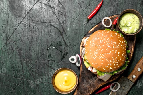 Preview: Fresh Burger With Beef, Bacon And Fresh Vegetables. On A Rustic Background.