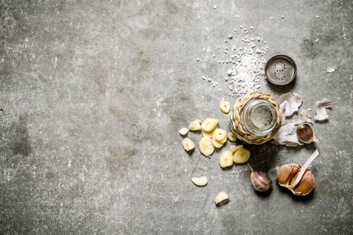 Preview: Spicy Background. Fragrant Garlic Salt. On A Stone Background.