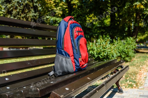 Preview: Tourist Backpack On Bench In City Park