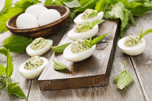 Preview: Boiled Eggs Stuffed With Nettles On The Table