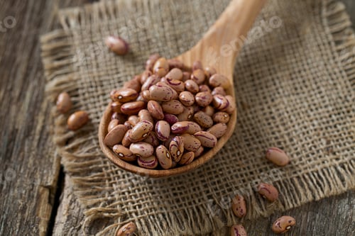 Preview: Pinto Beans On Wooden Surface