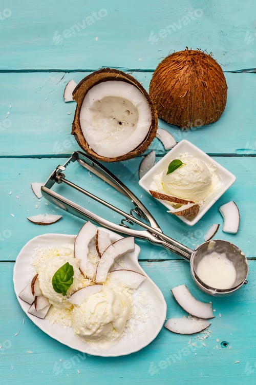 Preview: Lactose Free Coconut Ice Cream. Special Spoon, Halves Of Fruit, Flakes. Vegan Dessert Concept