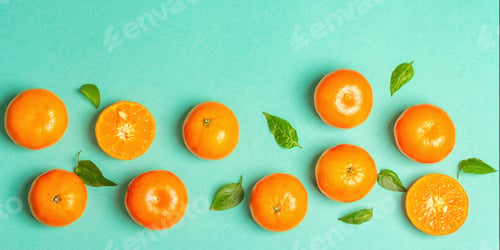 Preview: Ripe Juicy Tangerines And Fresh Leaves. Sunny Summer Turquoise Background, Top View, Banner Format