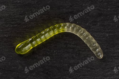 Preview: One Whole Green White Colourful Jelly Worm Candy Flatlay On Grey Stone