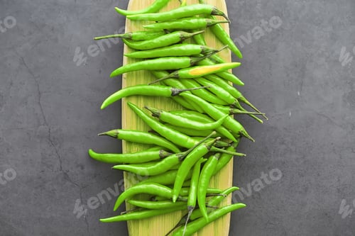 Preview: Hot Green Pepper. Chilean Pepper On A Black Background.