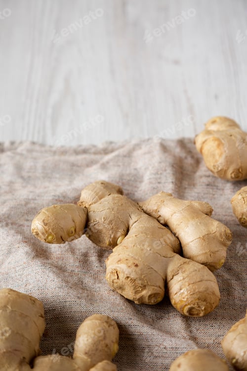 Preview: Raw Organic Ginger Root On Cloth, Low Angle View. Copy Space.