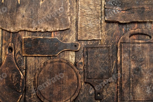 Preview: Serving Background. Different Old Cutting Board. On A Wooden Table.