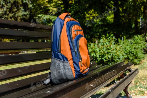 Preview: Tourist Backpack On Bench In City Park