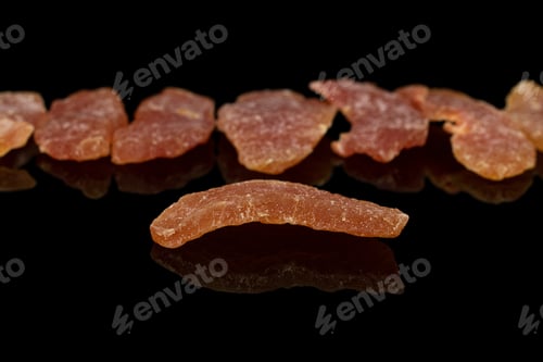 Preview: Group Of Eight Whole Dried Orange Papaya Piece Isolated On Black Glass