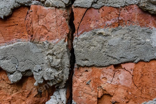 Preview: Texture Of The Cracked Red Bricks Wall As A Background